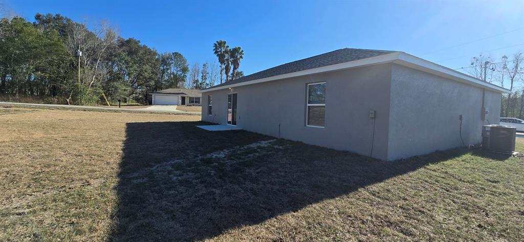 22 Pine Course Loop Ocala, FL 34472 - Photo 17 of 17 a view of a backyard of the house