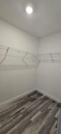 a view of a room with racks on the wall