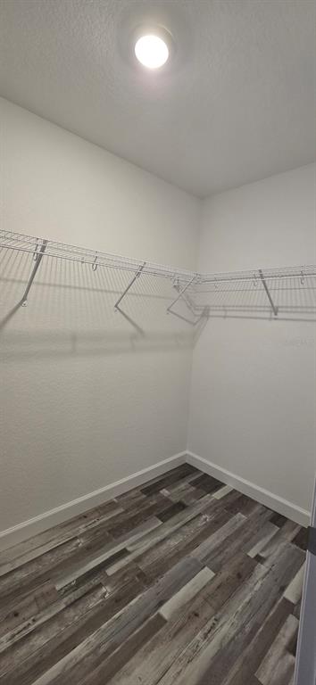 22 Pine Course Loop Ocala, FL 34472 - Photo 9 of 17 a view of a room with racks on the wall