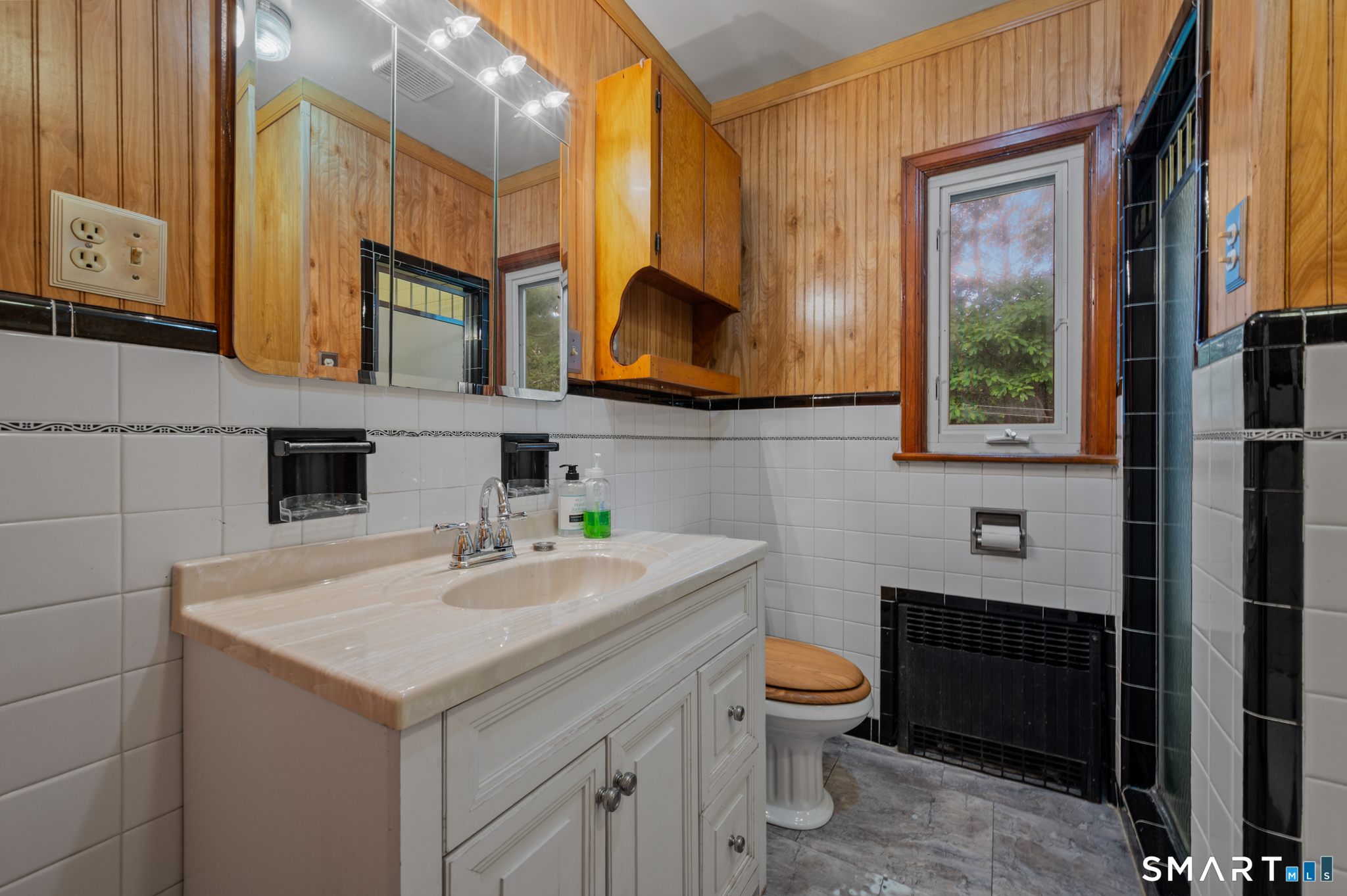 152 Ramstein Road New Hartford, CT 06057 - Photo 12 of 20 a bathroom with a sink and a mirror