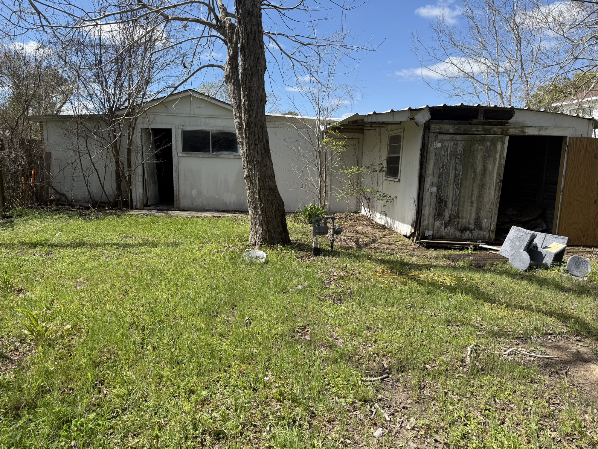 3122 Hamilton Street La Porte, TX 77571 - Photo 19 of 20 a backyard of a house with table and chairs