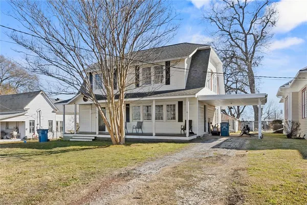a front view of house with yard