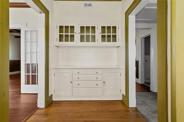 hallway view with wooden floor