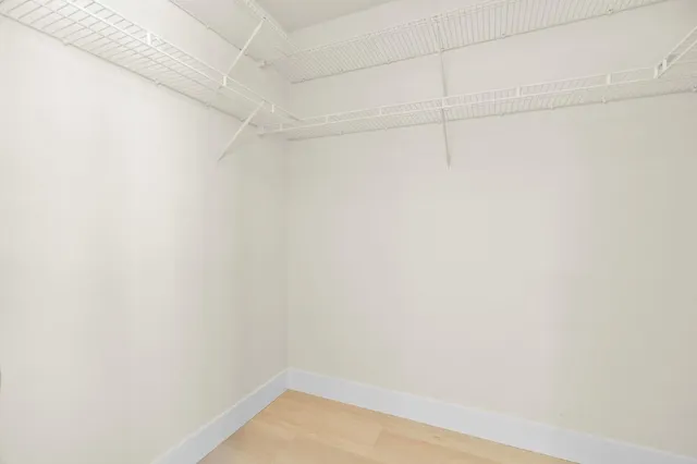 a view of a small space with racks on the wall