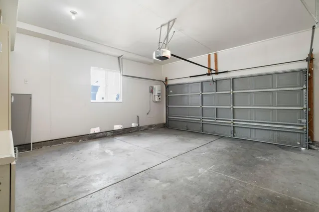 a view of an empty room with windows