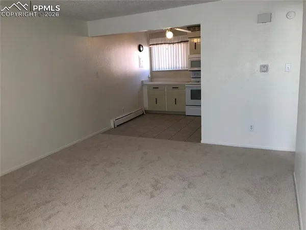an empty room with windows
