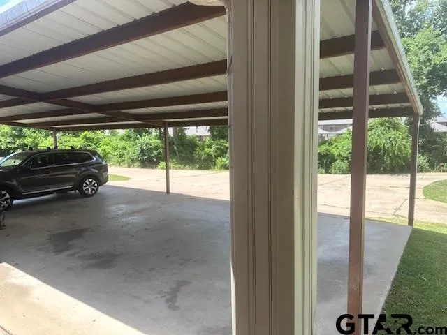 a view of a porch with furniture