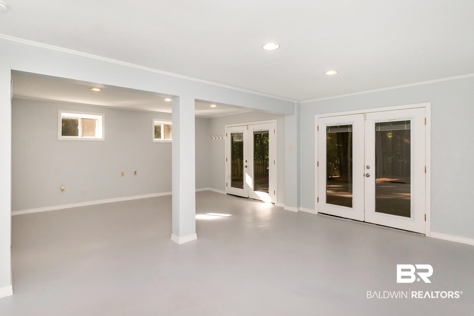 117 Ridgelawn Drive West Mobile, AL 36608 - Photo 24 of 31 This bonus room/living area on bottom level could be office, playroom and could even be turned into a mother-in-law suite.