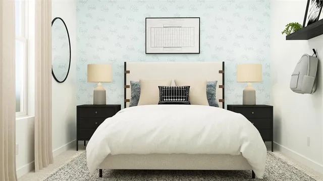 a bedroom with a bed and a dresser