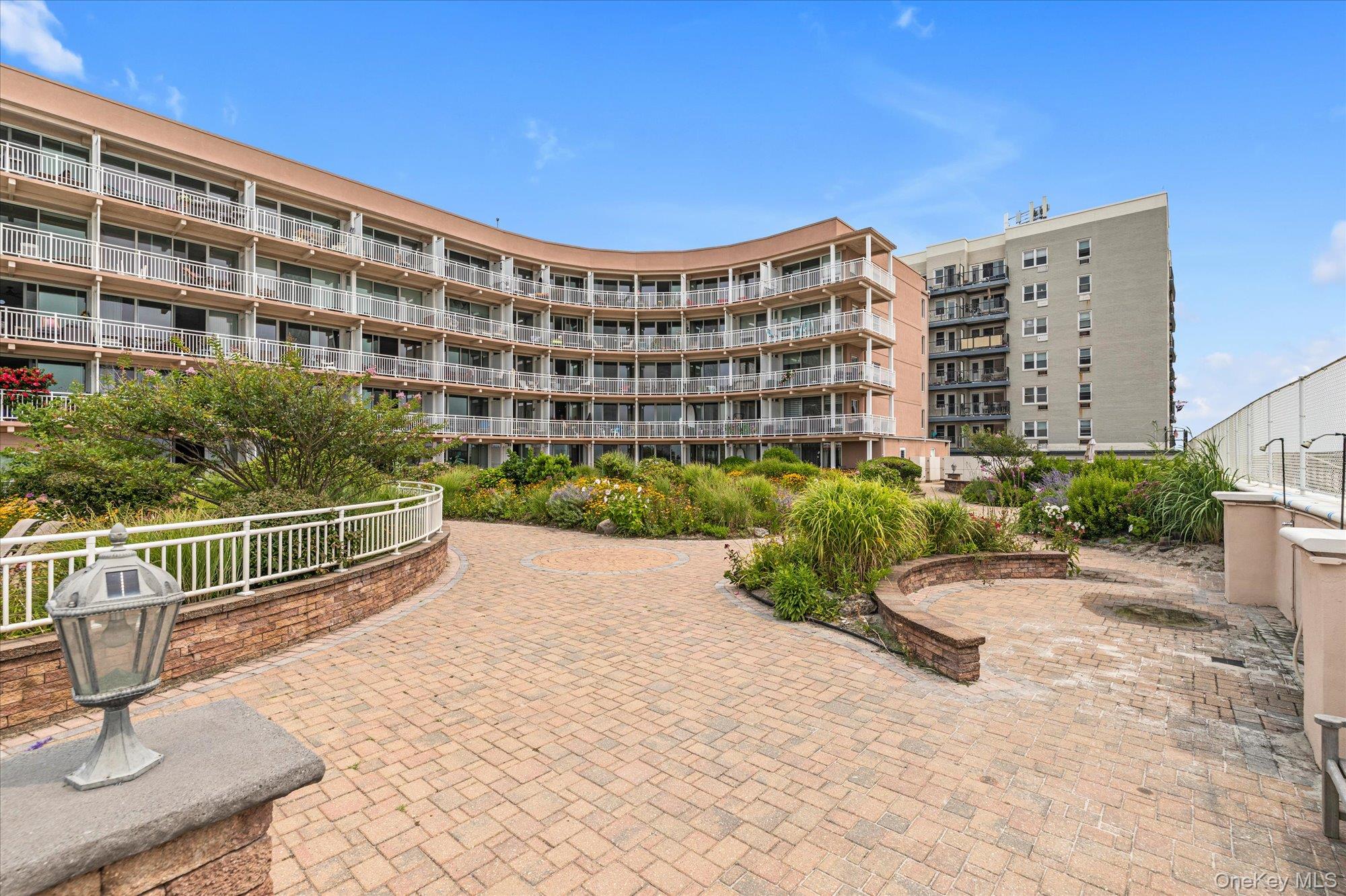 830 Shore Road, Unit 1F Long Beach, NY 11561 - Photo 15 of 21 a view of a building and outdoor space