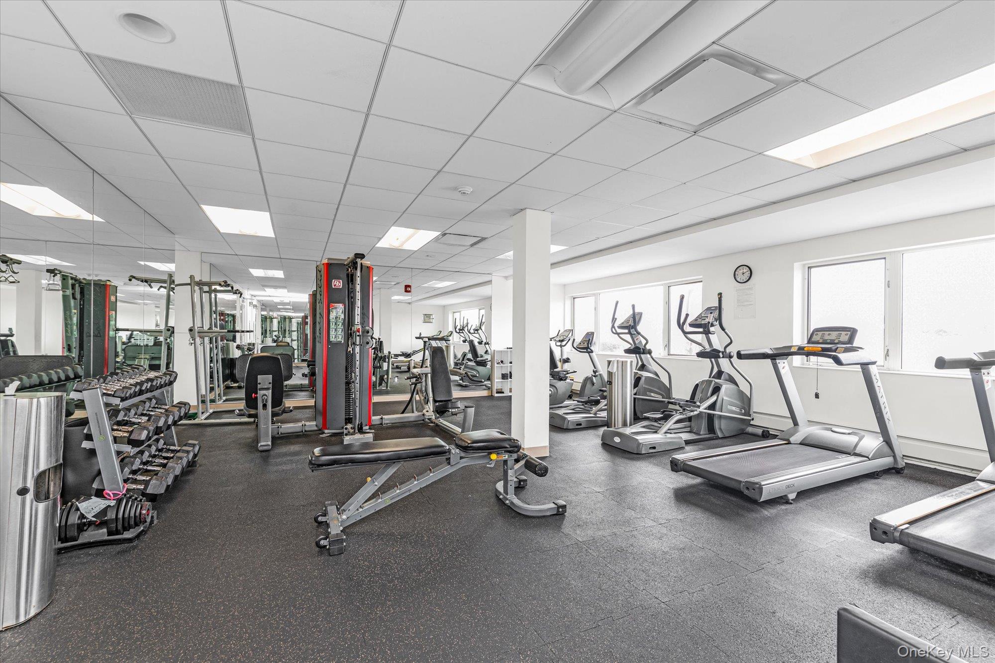 830 Shore Road, Unit 1F Long Beach, NY 11561 - Photo 17 of 21 a view of a room with gym equipment