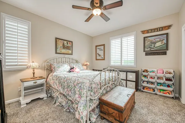 a view of a lake with a yard and lake view