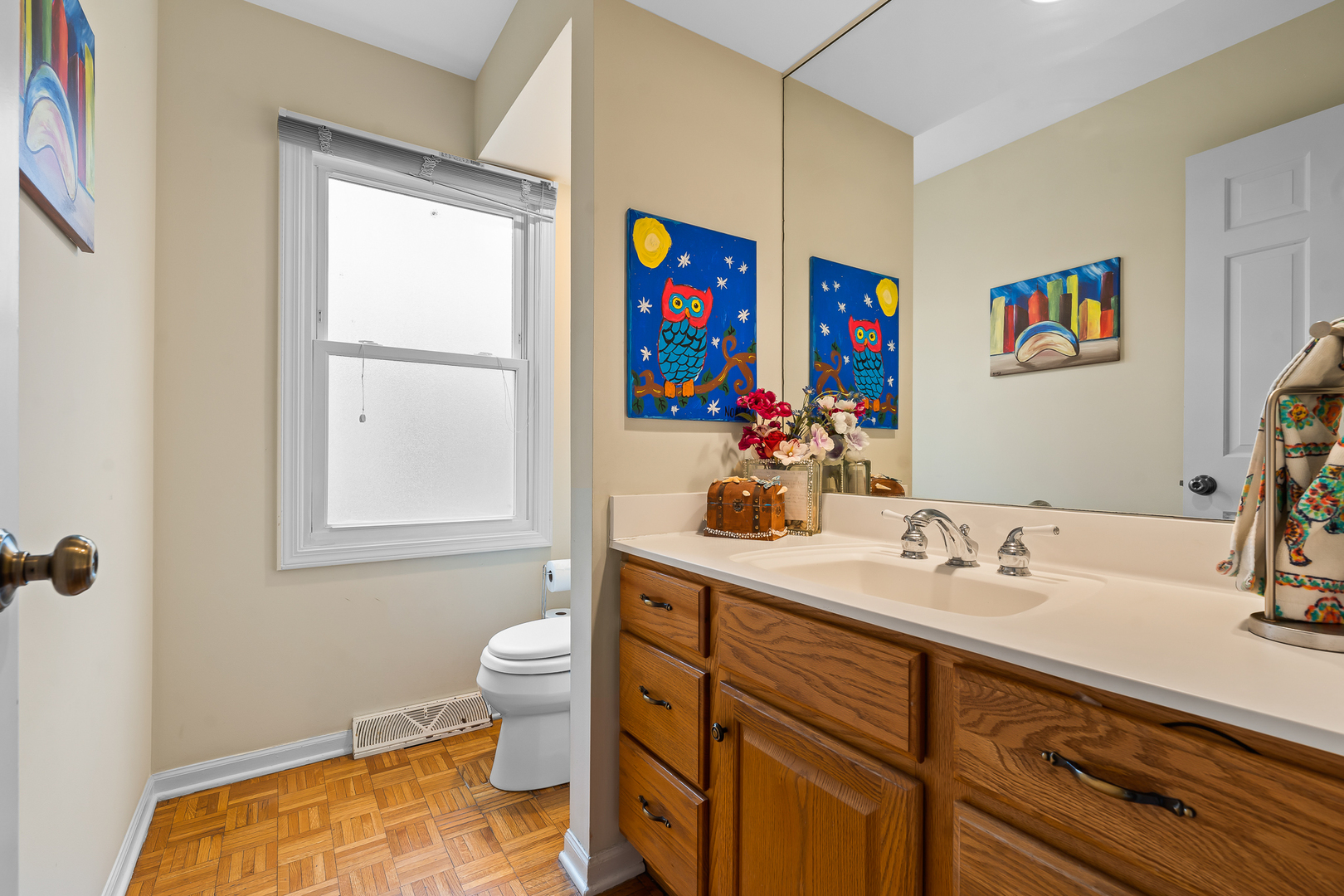 2849 Farmington Road Northbrook, IL 60062 - Photo 13 of 32 a bathroom with a sink a vanity and a window