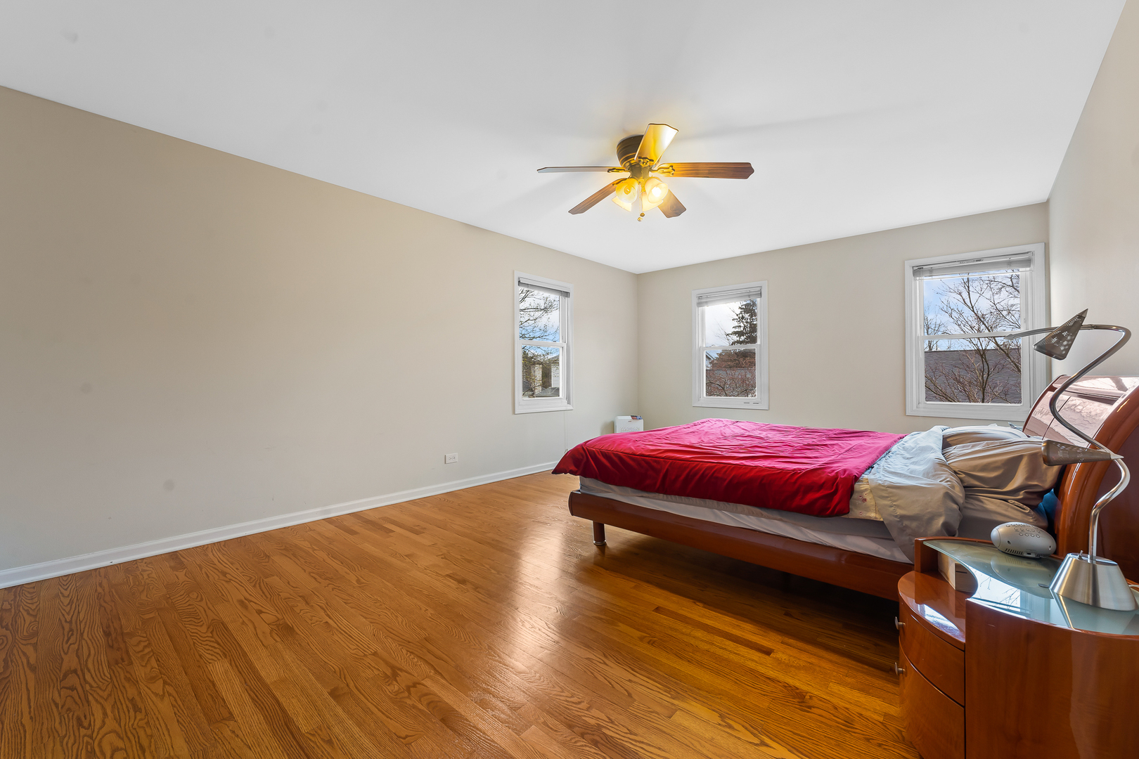 2849 Farmington Road Northbrook, IL 60062 - Photo 17 of 32 a bedroom with a bed and a chandelier