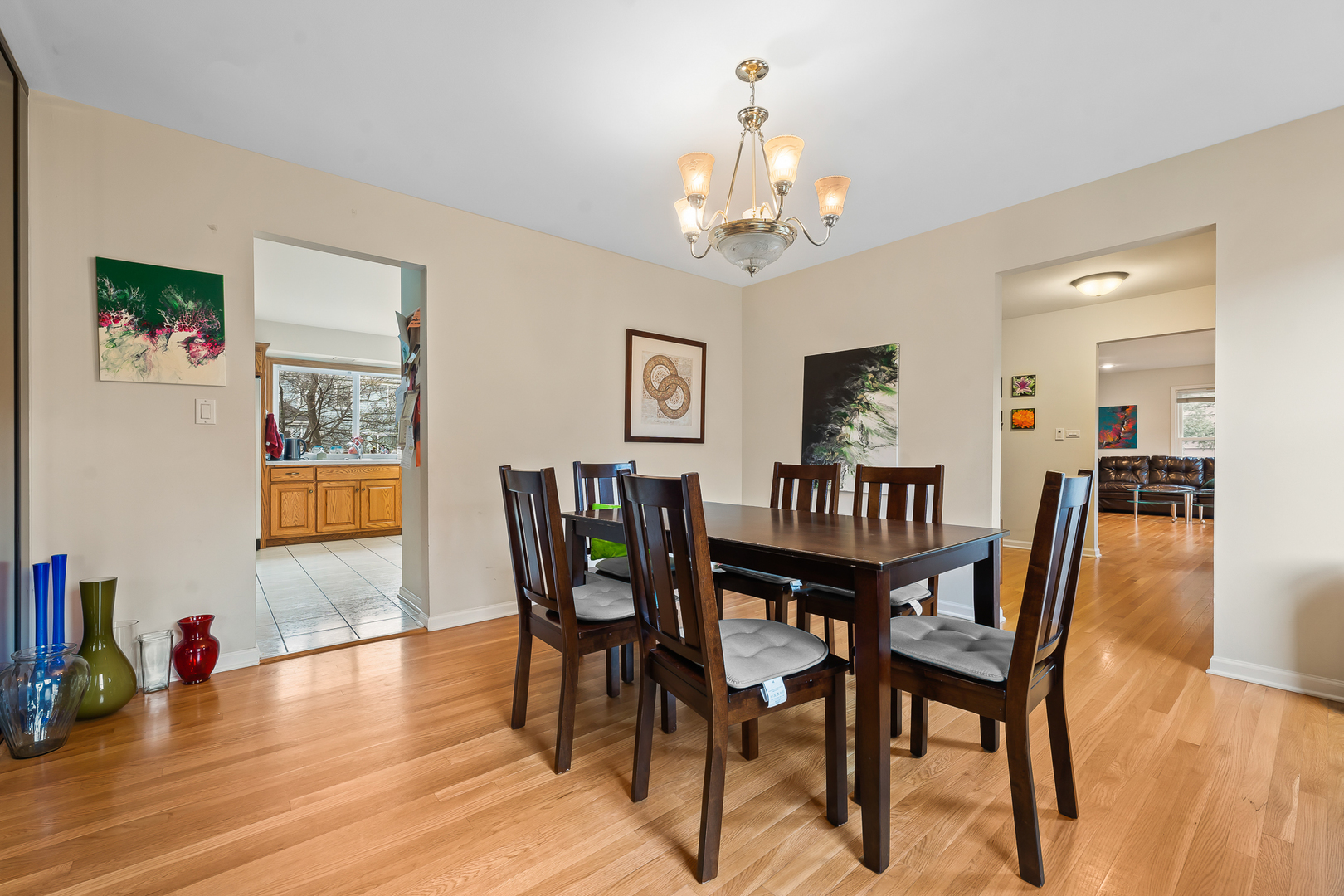 2849 Farmington Road Northbrook, IL 60062 - Photo 8 of 32 a view of a dining room with furniture wooden floor and chandelier