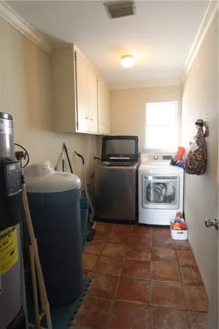 a kitchen with a sink a stove and cabinets