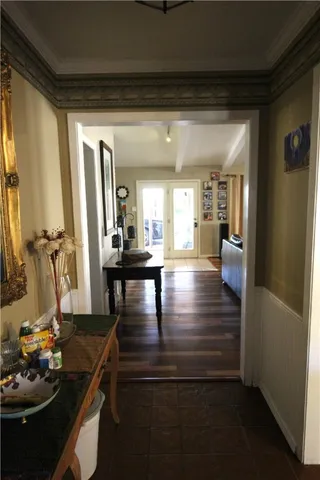 a dining room with table and chairs