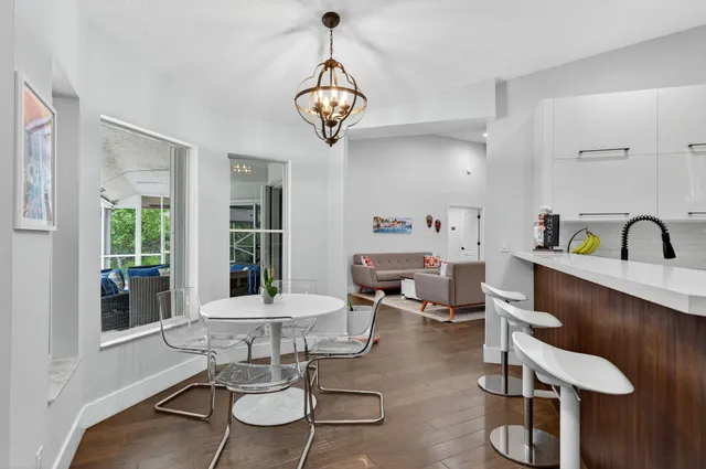 a view of a backyard with sitting area