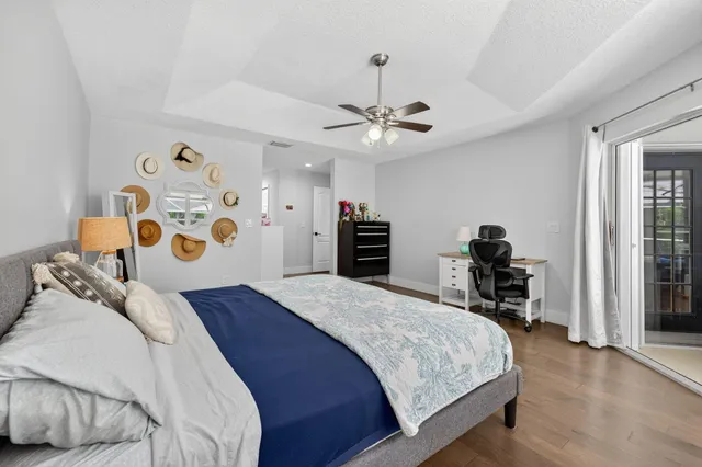 a view of swimming pool with outdoor seating