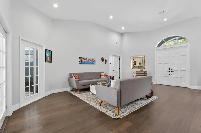 a view of walk in closet with clothes