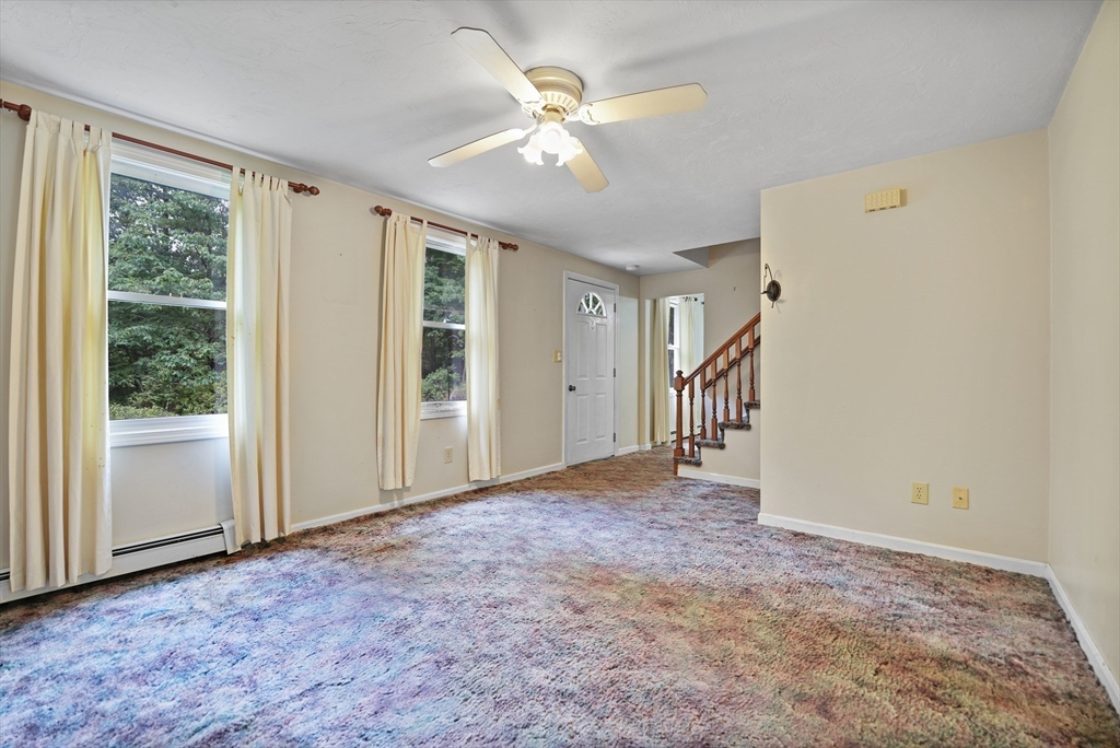 24 Springwood Drive Rochester, MA 02770 - Photo 12 of 21 a view of an empty room with a window