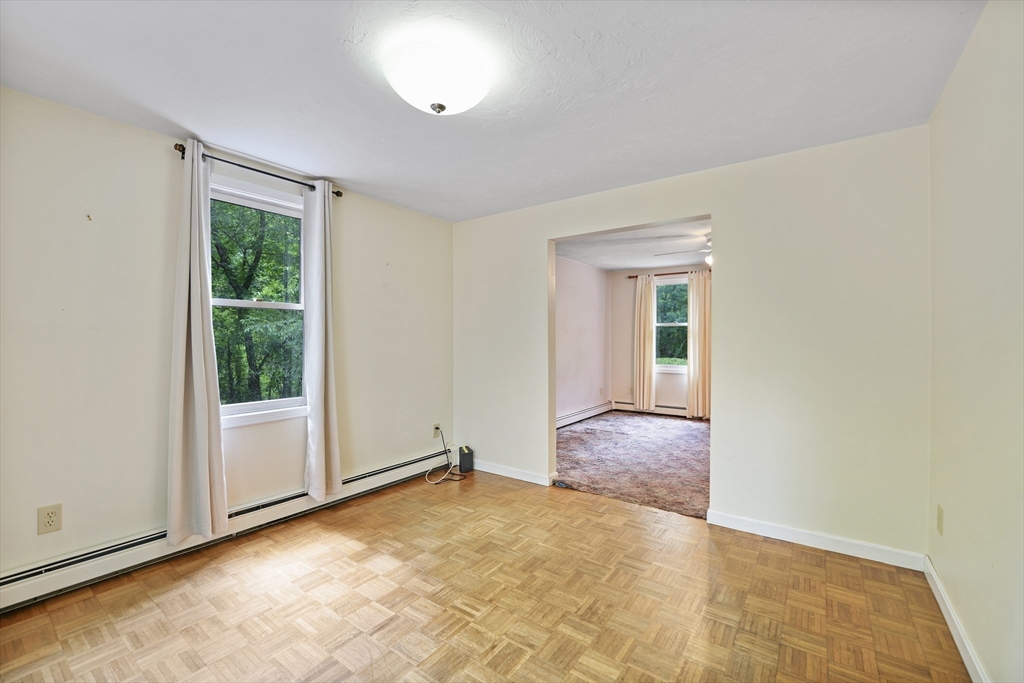 24 Springwood Drive Rochester, MA 02770 - Photo 10 of 21 an empty room with a empty space and window
