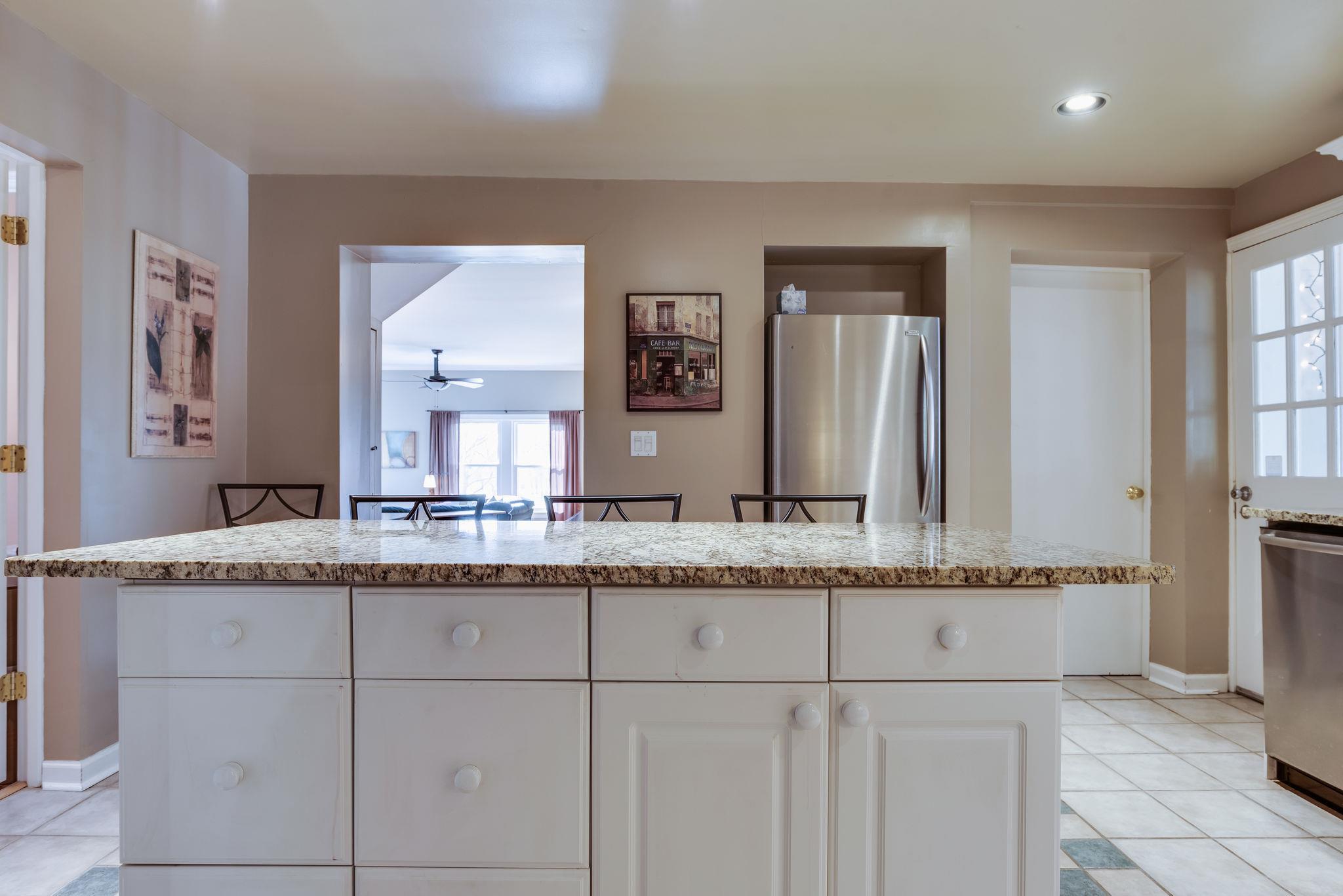4133 Arno Road Franklin, TN 37064 - Photo 15 of 30 a bathroom with a granite countertop sink and a mirror