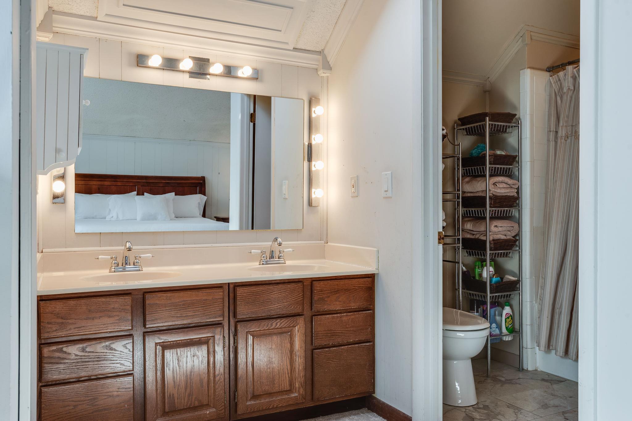 4133 Arno Road Franklin, TN 37064 - Photo 24 of 30 a bathroom with a sink and a mirror