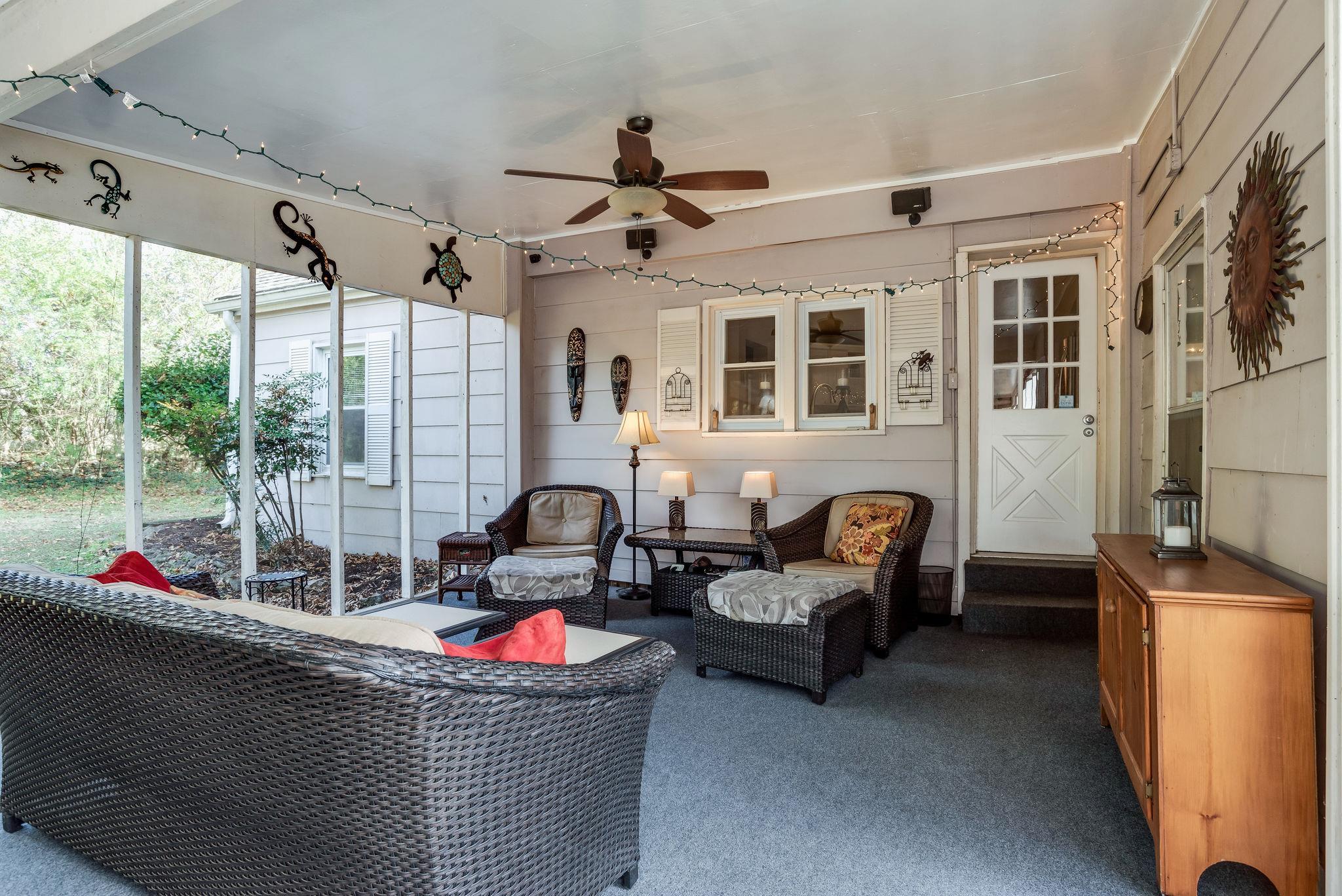 4133 Arno Road Franklin, TN 37064 - Photo 26 of 30 a living room with furniture cabinets and a window