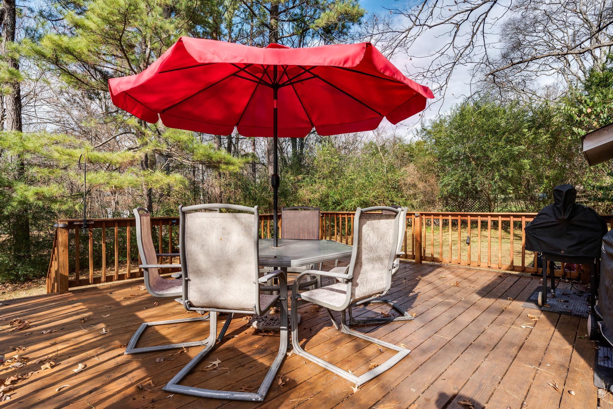 4133 Arno Road Franklin, TN 37064 - Photo 28 of 30 a view of balcony with wooden floor and outdoor seating