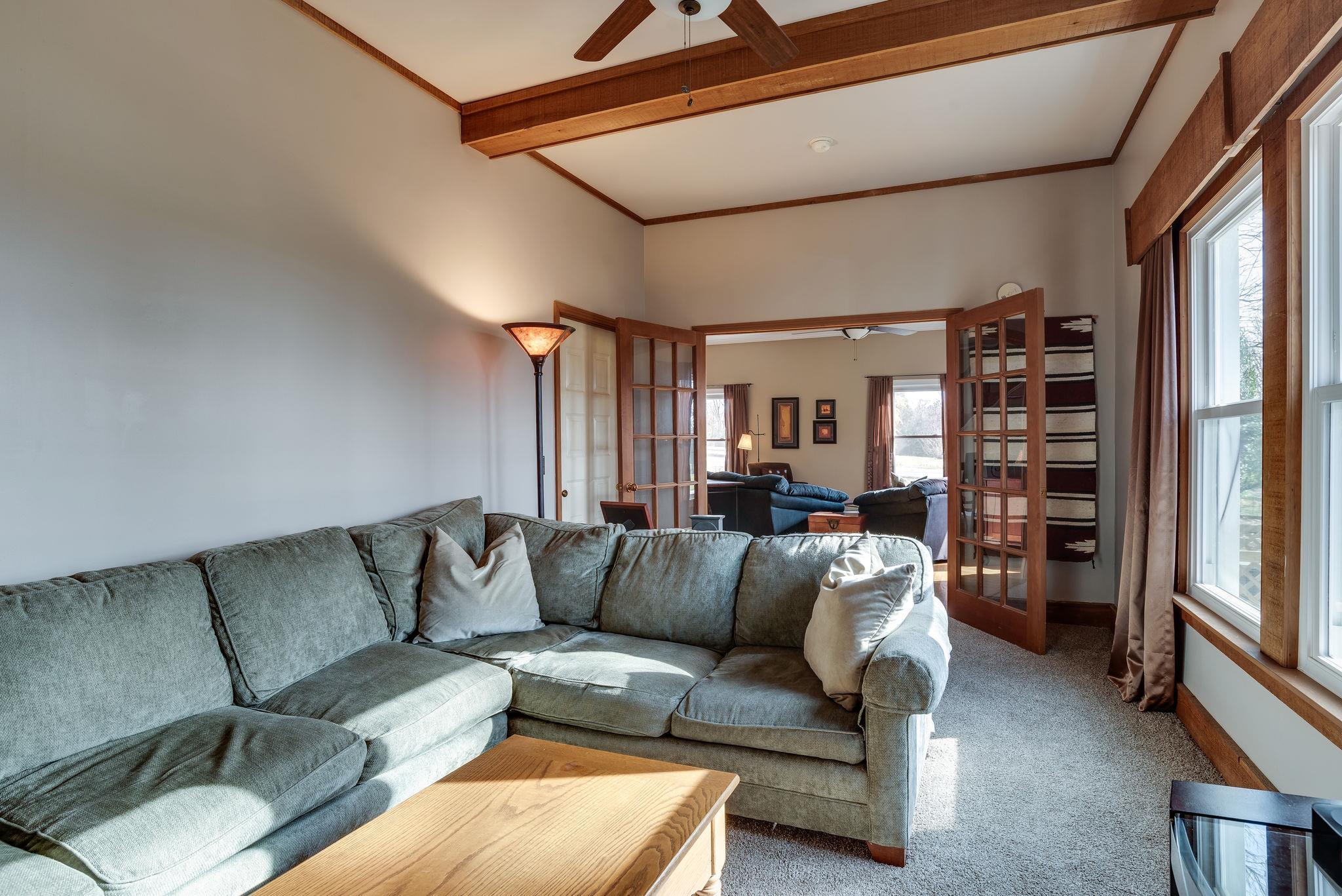 4133 Arno Road Franklin, TN 37064 - Photo 10 of 30 a living room with furniture and a couch