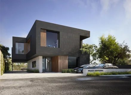 a view of a house with a yard and garage