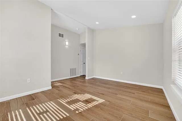 a view of an empty room and window