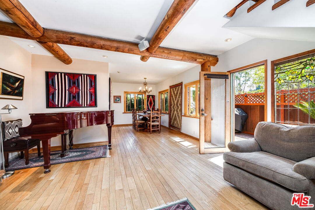 454 East Rustic Road Santa Monica, CA 90402 - Photo 12 of 34 a living room with furniture and a wooden floor