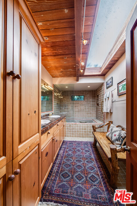 454 East Rustic Road Santa Monica, CA 90402 - Photo 28 of 34 a very nice looking room with a rug