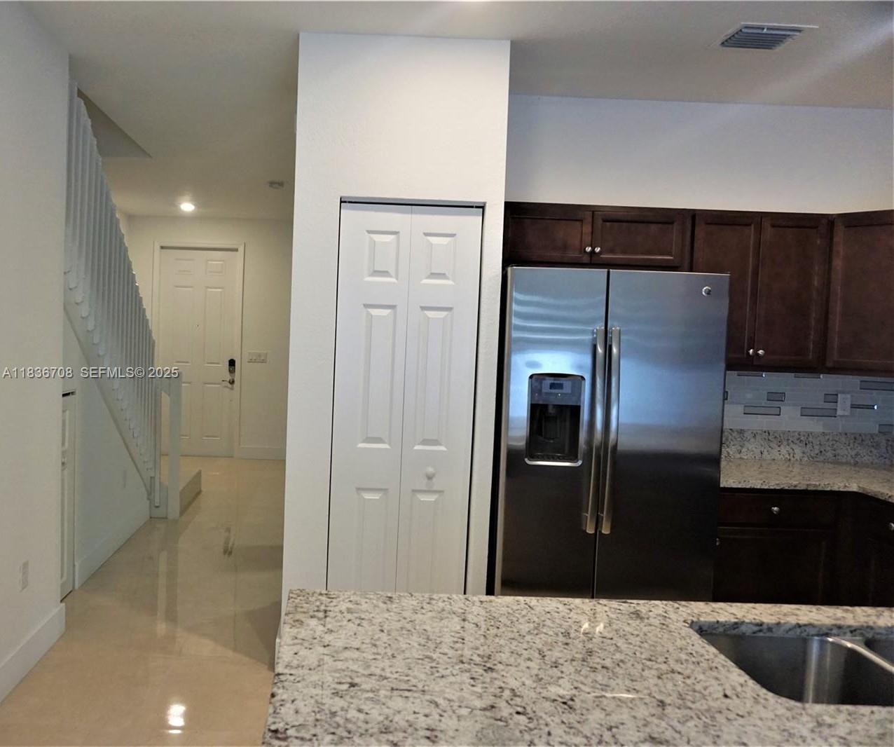 10498 West 33rd Way Hialeah, FL 33018 - Photo 14 of 28 a bathroom with a shower and a sink