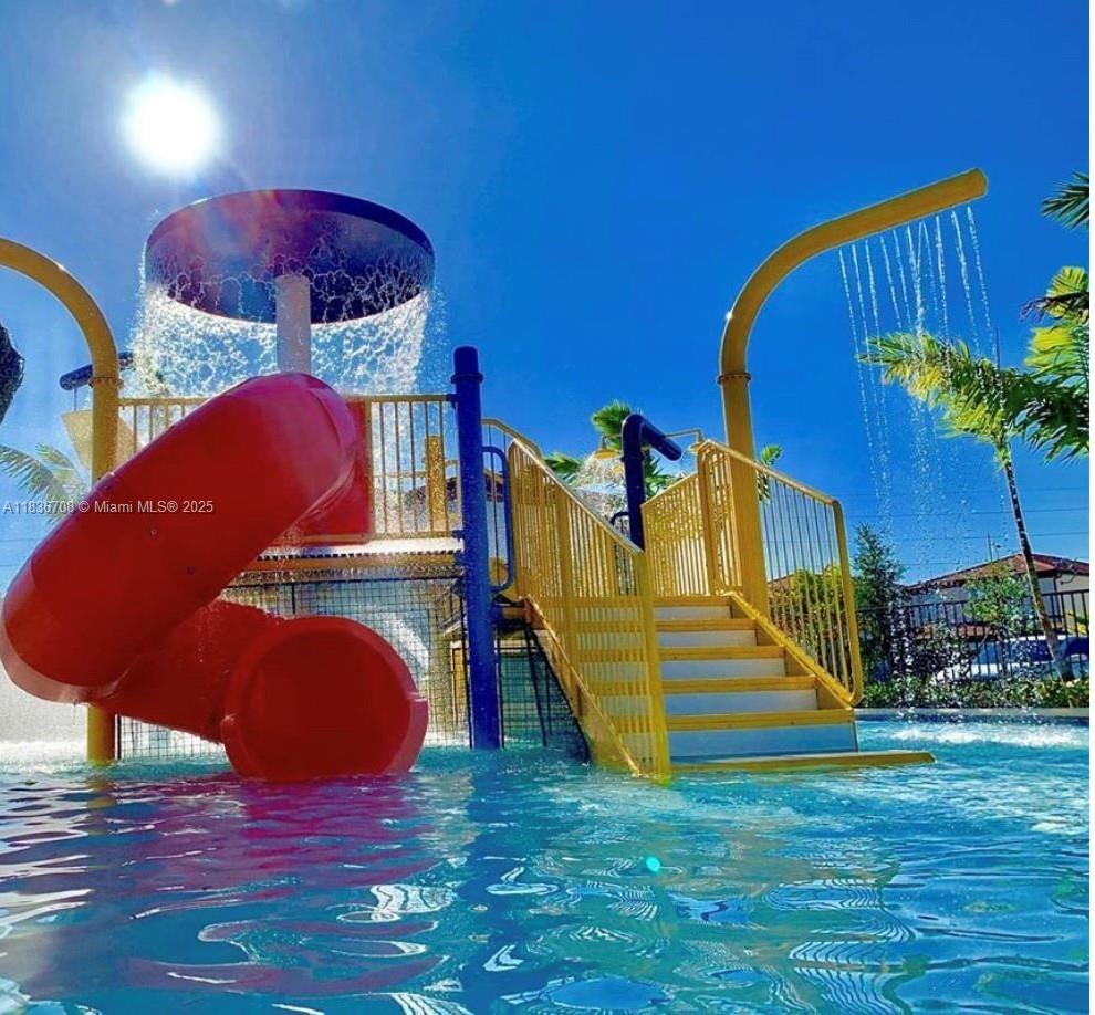 10498 West 33rd Way Hialeah, FL 33018 - Photo 26 of 28 a view of a house with a backyard