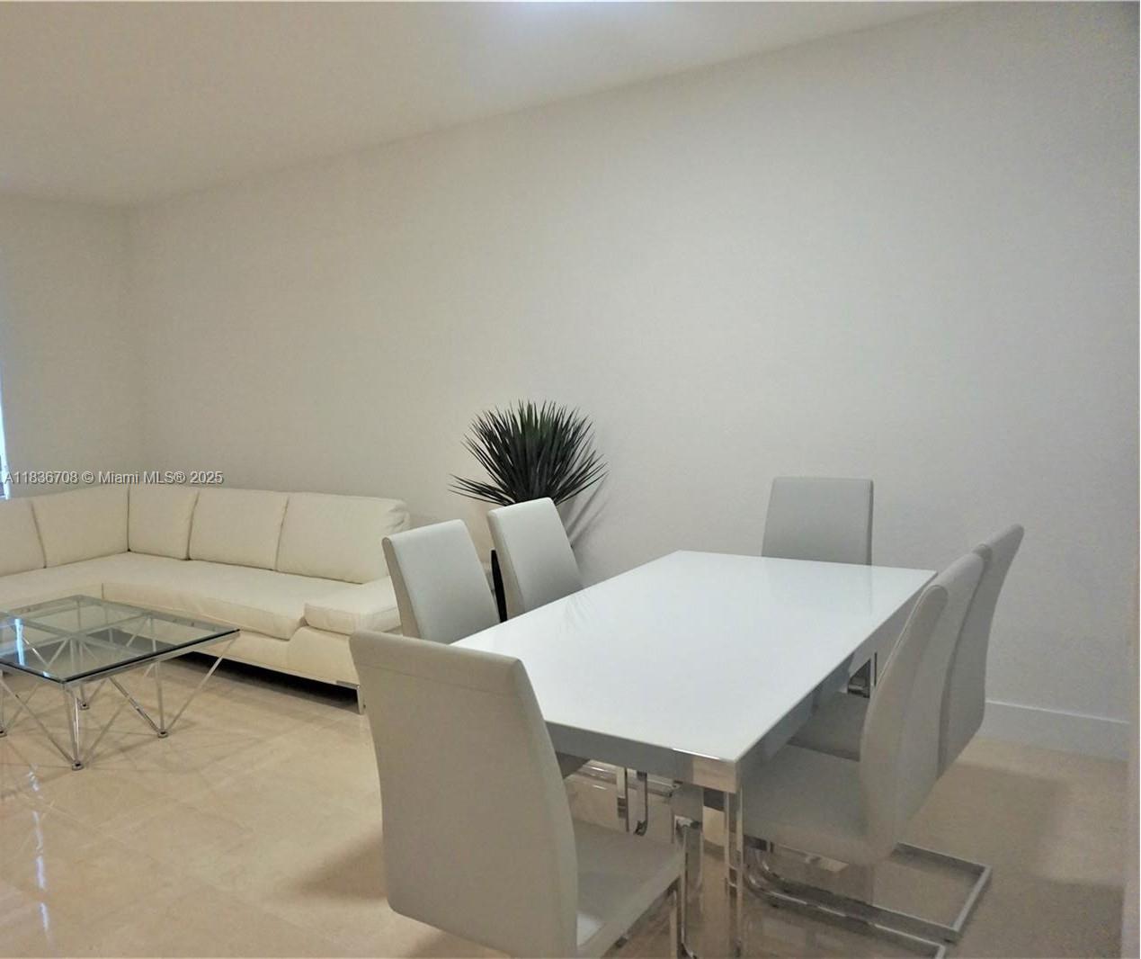 10498 West 33rd Way Hialeah, FL 33018 - Photo 6 of 28 a view of a dining room with furniture