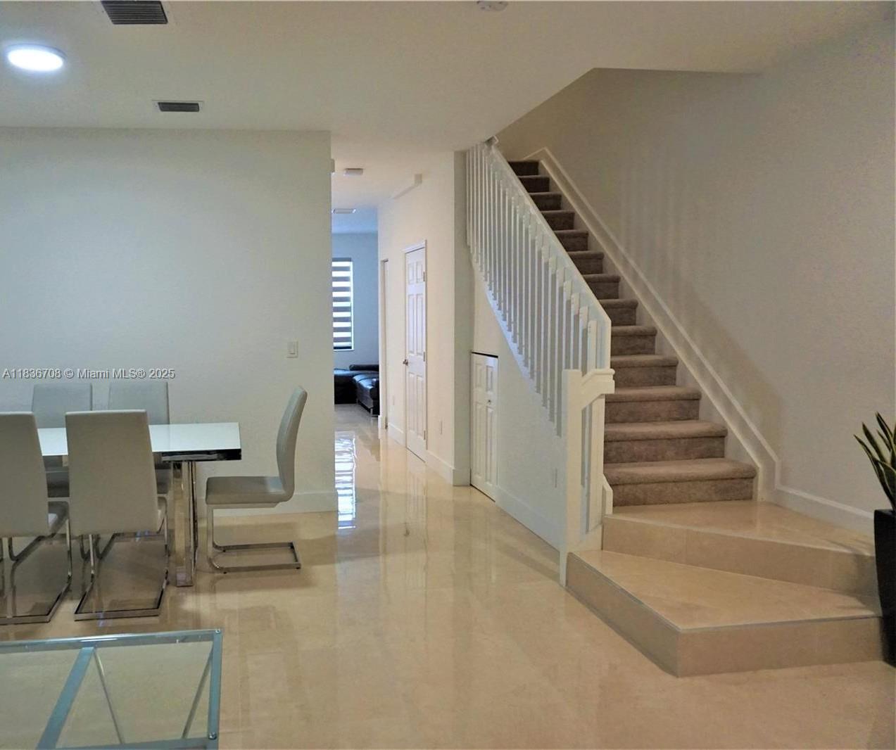 10498 West 33rd Way Hialeah, FL 33018 - Photo 7 of 28 a view of entryway and hall