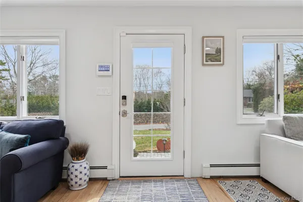 a living room with furniture and a window
