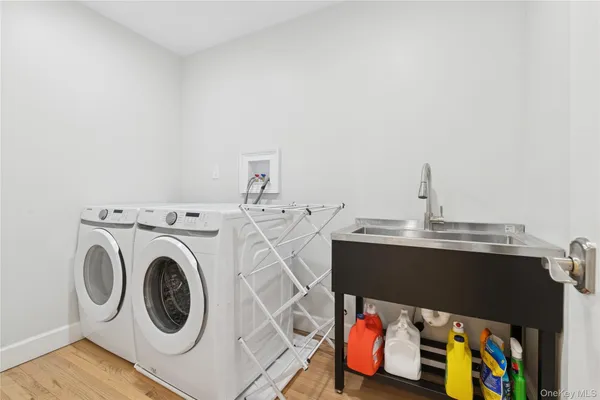 a utility room with dryer and washer