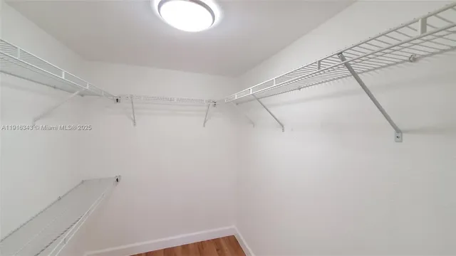 an empty room with a bathroom