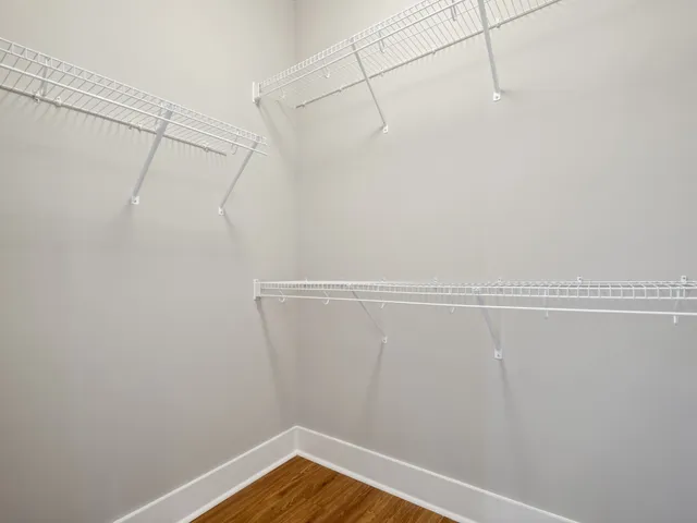 a view of a room with racks on the wall