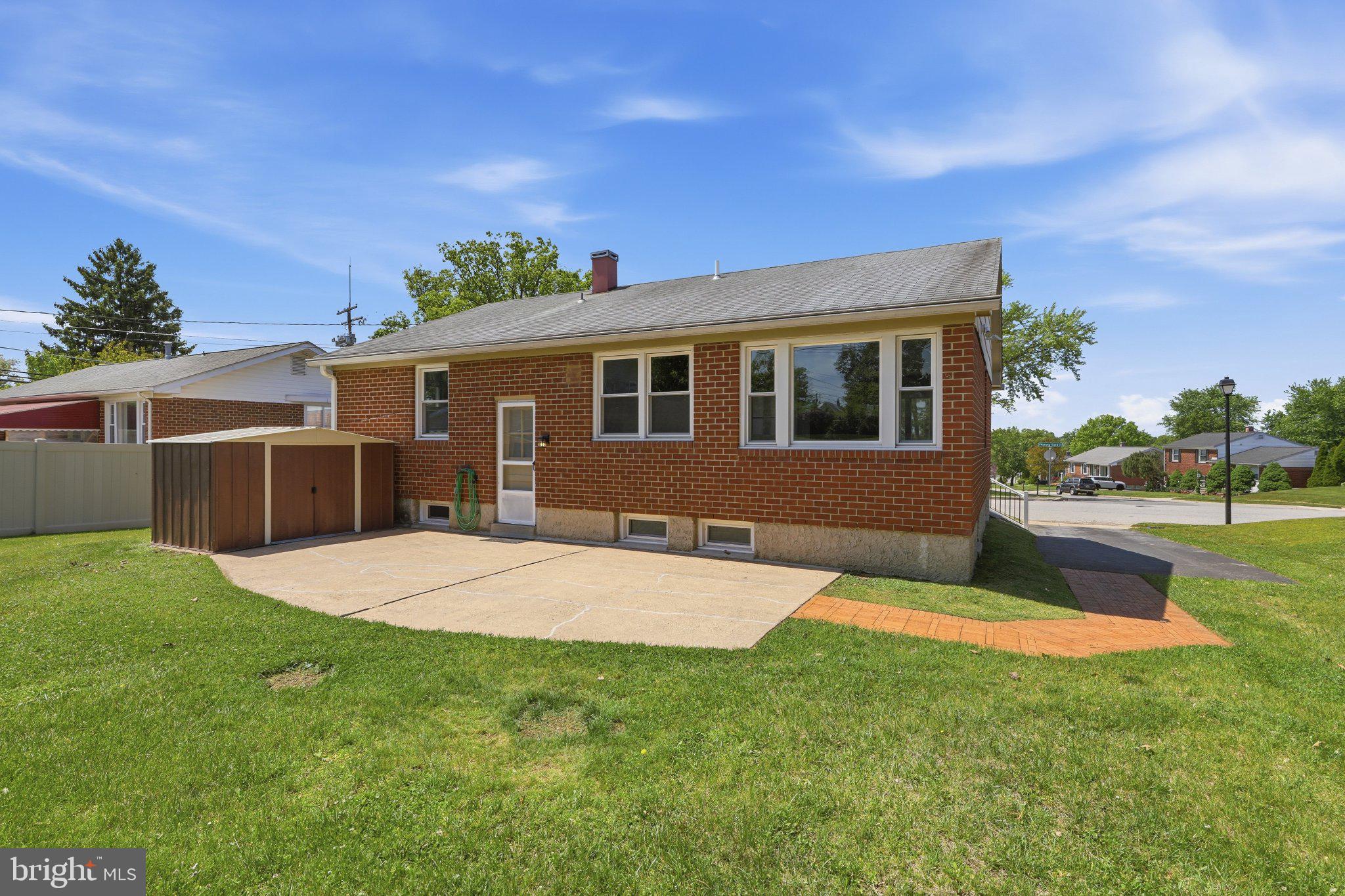 9005 Perring Park Road Baltimore, MD 21234 - Photo 17 of 20 a house view with a garden space