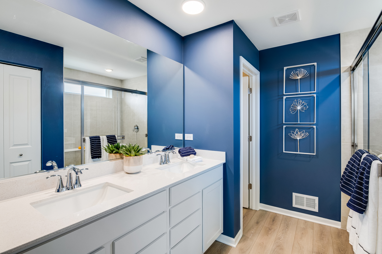 571 Lismore Circle Elgin, IL 60124 - Photo 15 of 24 a bathroom with a double vanity sink and a mirror