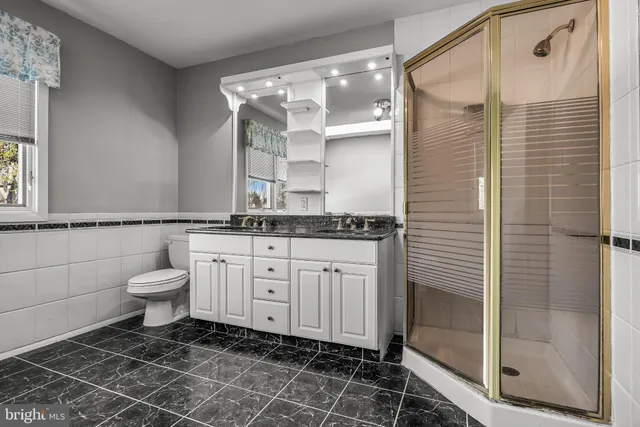 a view of room with ceiling fan