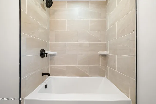 a bathroom with a bathtub