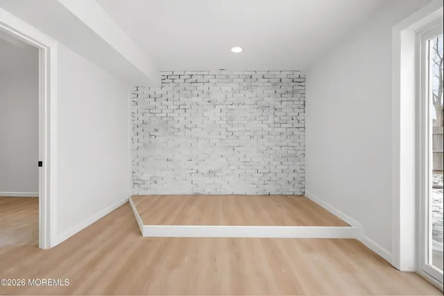 a view of a big room with wooden floor