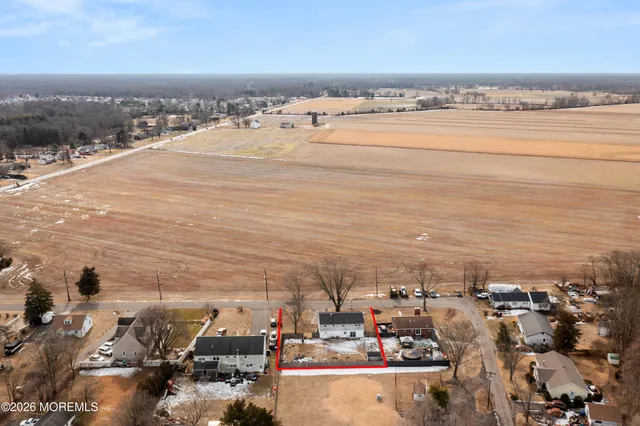 an aerial view of beach and ocean