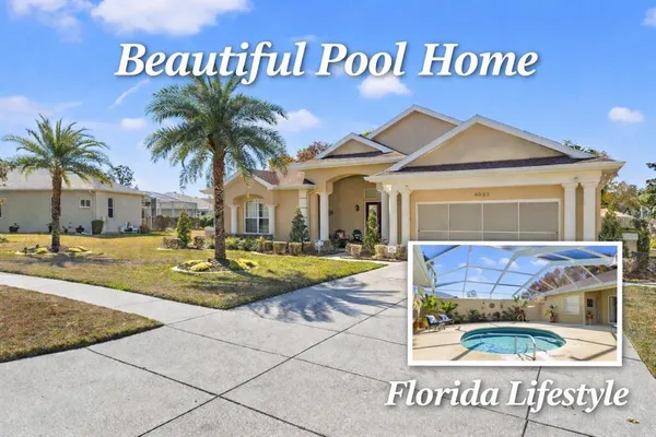 a view of a house with a swimming pool